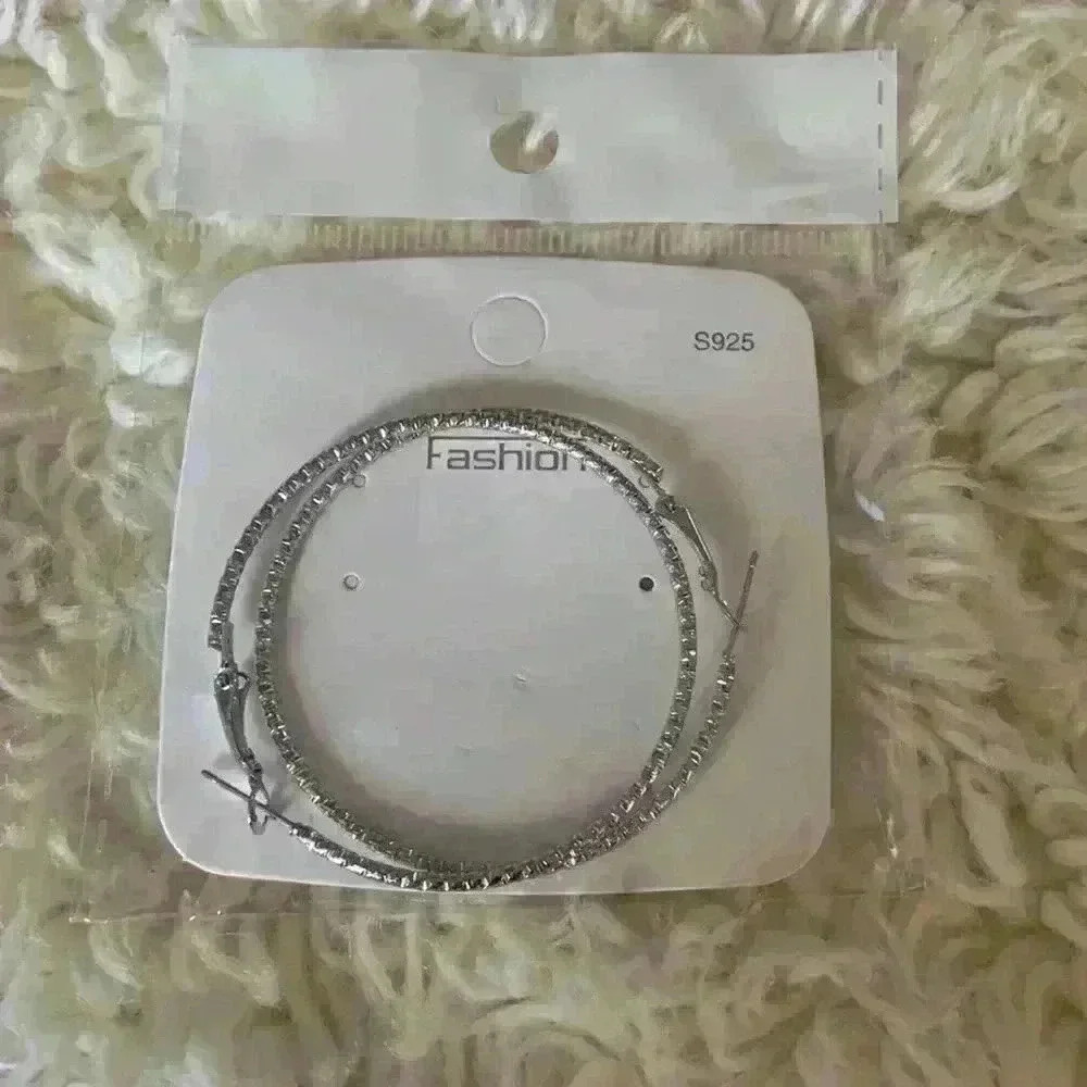 Thin silver hoop earrings